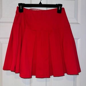 Sparkle City Pleated Spirit Skirt in Red. Size M